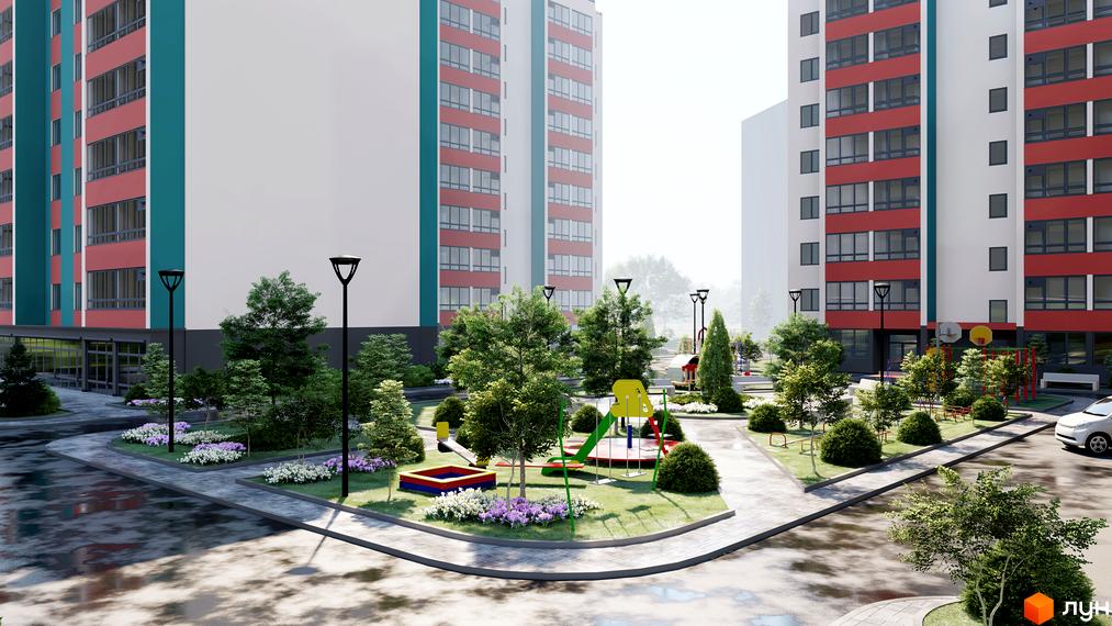 Житловий комплекс Мрія з червоно-білими фасадами та зеленою прибудинковою територією з дитячим майданчиком.