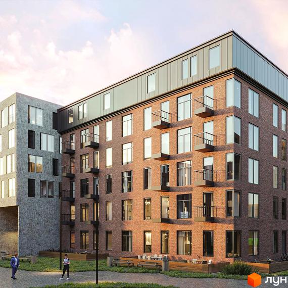 Цегляний будинок житлового комплексу Єкатеринославське Депо з великими вікнами та балконами. На території комплексу є зелена зона з лавками.