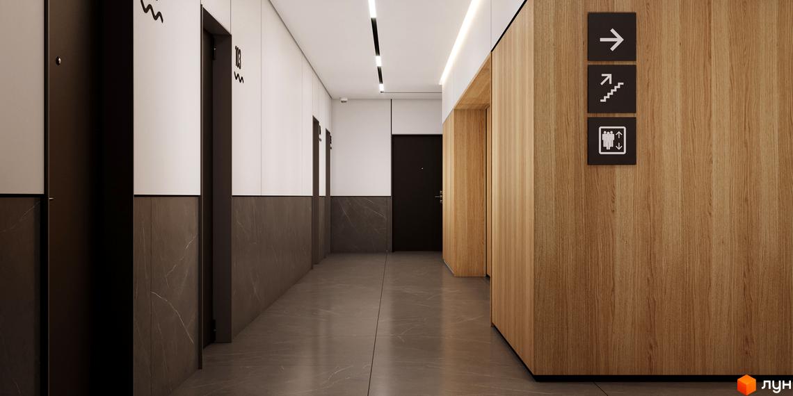 Апарт-комплекс „Морська резиденція“: сучасний коридор з ліфтами та вказівниками напрямку. Оздоблення стін деревом та мармуровою плиткою.