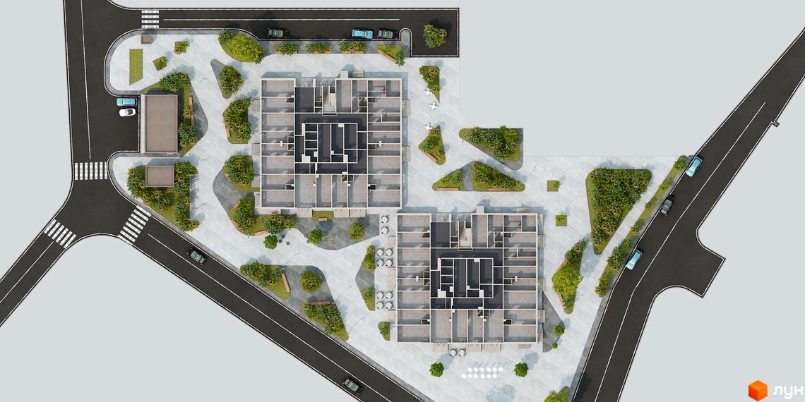 Апарт-комплекс „Морська резиденція“ з висоти пташиного польоту, що демонструє його архітектуру та прибудинкову територію з зеленими зонами та дорогою.