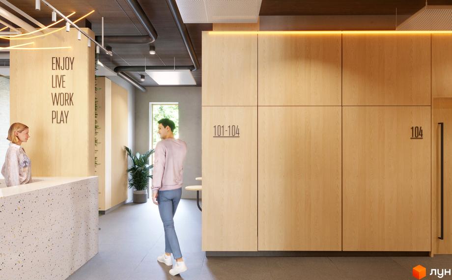 Сучасний дизайн лобі житлового комплексу 7 Avenue з дерев'яними панелями та написом 