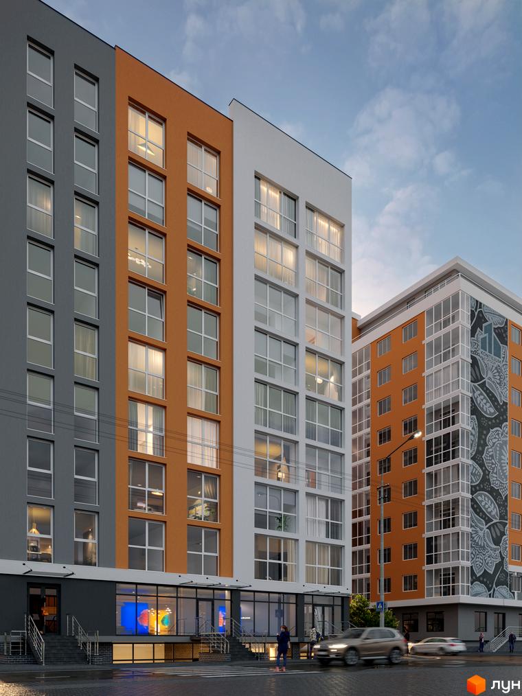 Зовнішній вигляд житлового комплексу Затишний з фасадами сірого, помаранчевого та білого кольорів. На передньому плані видно дорогу з автомобілями та пішохідний перехід.