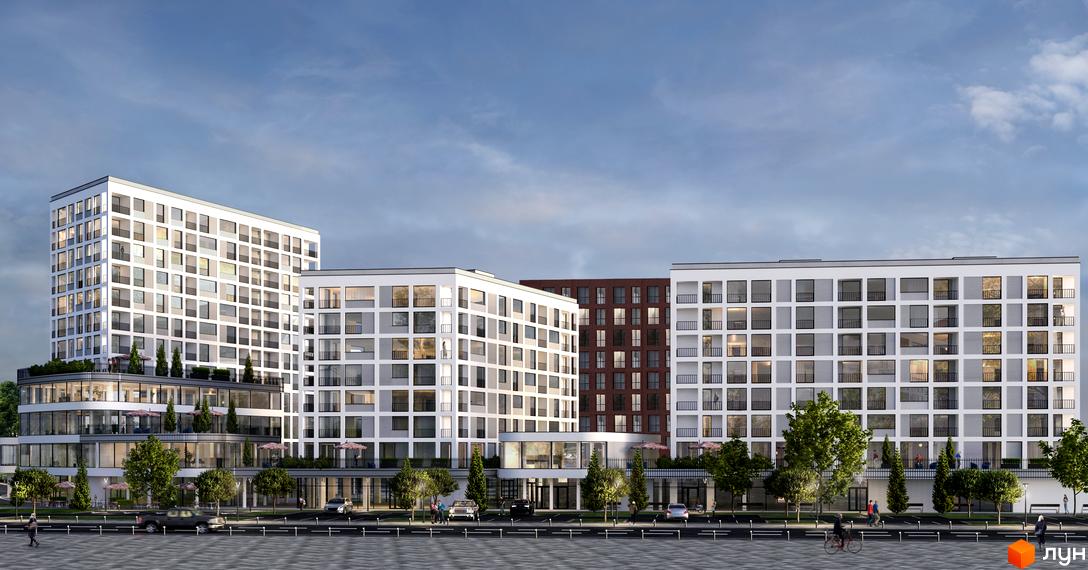 Багатоповерховий будинок ЖК Шенген з панорамними вікнами та балконами. На прибудинковій території висаджені дерева та облаштовані місця для відпочинку.