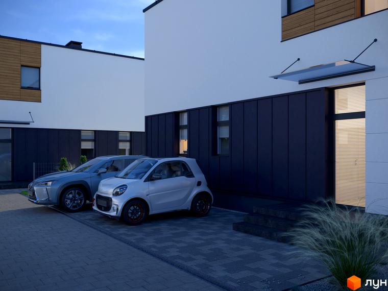 Зображення будинку в Котеджному містечку 10 Families з автомобілями на подвір'ї. Фасад будинку оздоблено темними панелями.