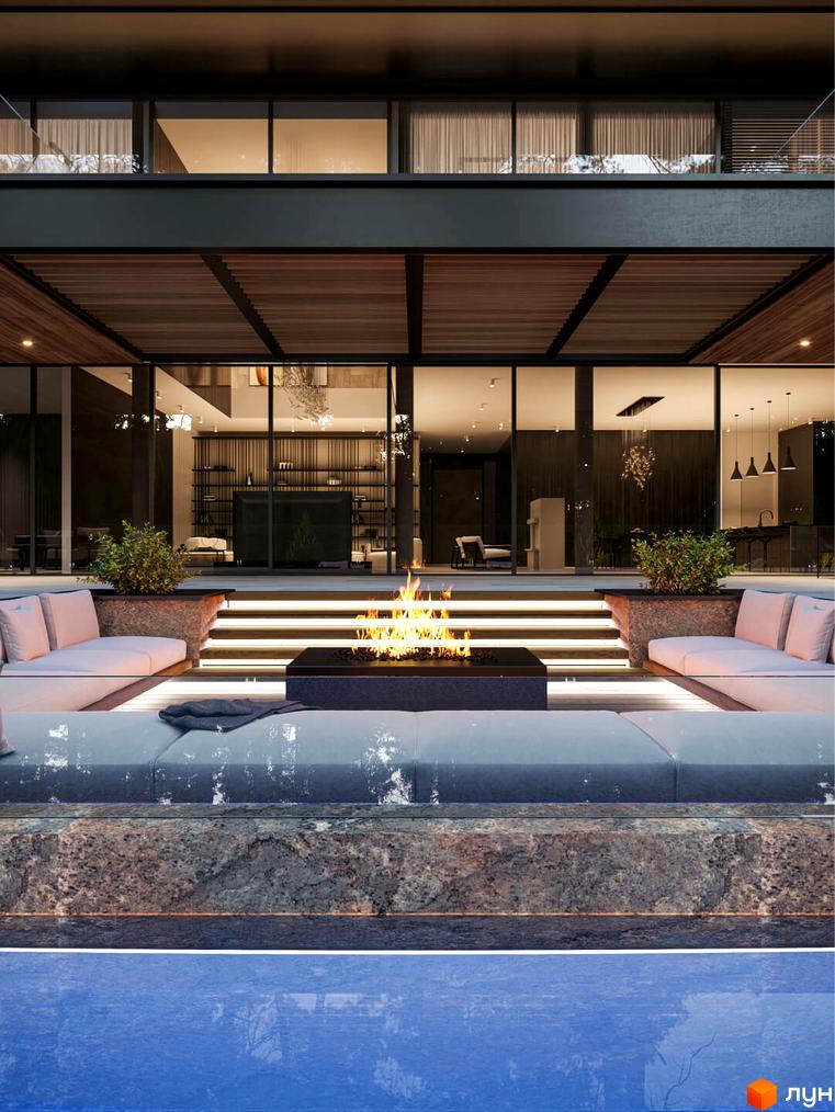 Котеджне містечко Miracle Residence: Вечірній вигляд будинку з великими вікнами та дерев'яними елементами. Навколо будинку облаштована тераса з вогнищем та м'якими меблями.