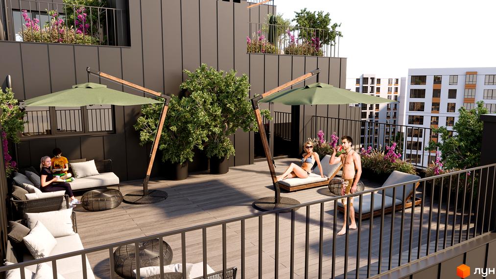 Відкрита тераса житлового комплексу Квартал Віденський з шезлонгами та парасолями. На терасі відпочивають люди, поруч видно багатоповерхові будинки.