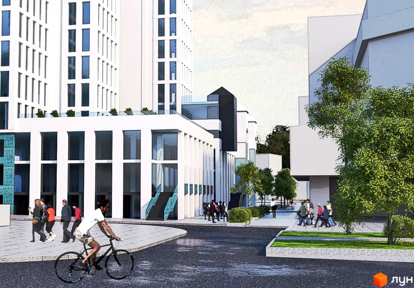 Зображення Житлового комплексу Метрополь з білосніжним фасадом та великими вікнами. На передньому плані пішохідна зона з деревами.