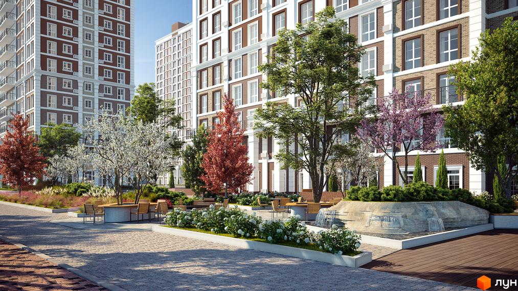 Житловий комплекс Nova England з червоно-білими фасадами та доглянутою прибудинковою територією з фонтаном та зонами відпочинку.