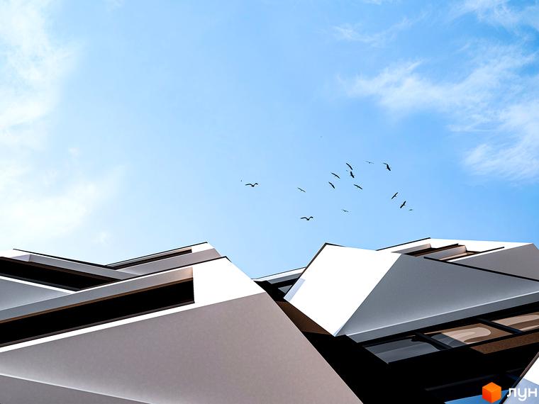 Зображення фасаду та даху комплексу Паркова Алея на фоні блакитного неба з птахами. Архітектура будинку з геометричними формами.