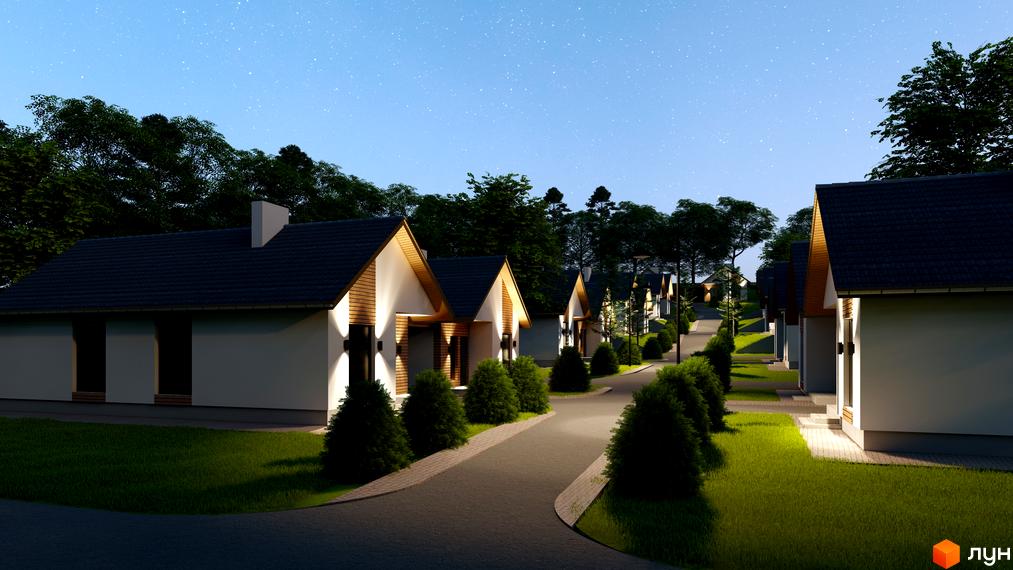 Будинки Котеджного містечка Буде Дім. Підберізці з темними дахами та світлими фасадами, доглянуті газони та освітлена дорога.