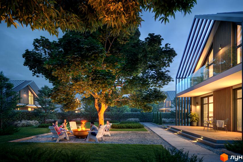 Котеджне містечко КМ Зоряний: затишний вечір біля каміна з друзями на фоні сучасних будинків та доглянутої території.