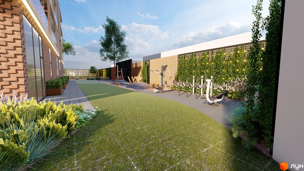 Житловий комплекс OKRUZHNA HALL з цегляним фасадом. На території спортивний майданчик, зелені насадження та місця для відпочинку.