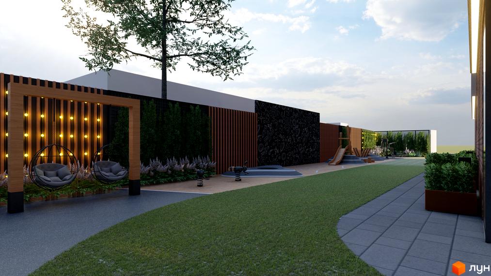 Частина фасаду Житлового комплексу OKRUZHNA HALL з освітленням. Облаштована прибудинкова територія з ігровим майданчиком та зоною відпочинку.