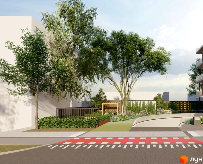 Новобудова OKRUZHNA HALL: світлі фасади будівель, доглянута прибудинкова територія з великими деревами та пішохідною зоною.