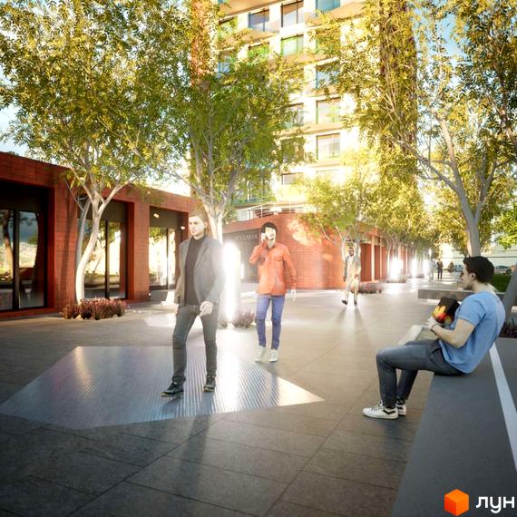 Житловий комплекс на Величковського: фасади будівель з цегляним оздобленням та кольоровими вікнами, зелена прибудинкова територія з пішохідними зонами та місцями для відпочинку.