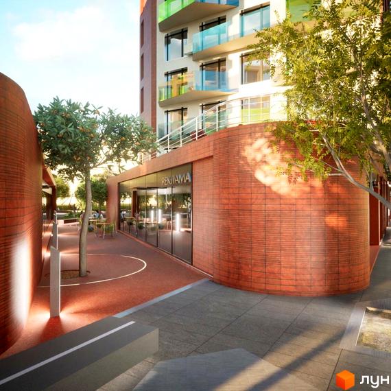 Житловий комплекс на Величковського: фасади будівель з кольоровими елементами та прибудинкова територія з деревами та місцями для відпочинку.