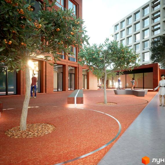 Зовнішній вигляд новобудови ЖК на Величковського з цегляним фасадом та прибудинковою територією з деревами та місцями для відпочинку.