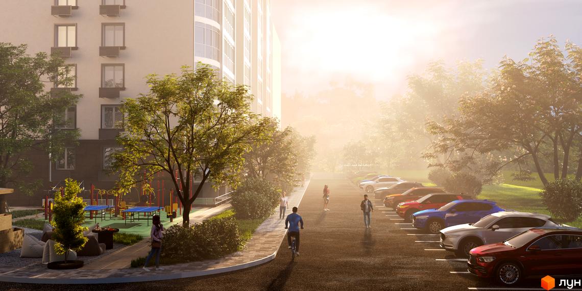 Житловий комплекс Теплий дім Plus з фасадом з вікнами та кондиціонерами, поруч дитячий майданчик з ігровими зонами та парковка з автомобілями.