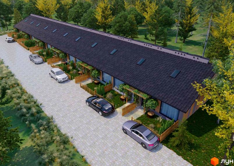 Таунхауси Harmony Land з темним дахом та індивідуальними ділянками, розташовані на бруківці з паркуванням та зеленою зоною.