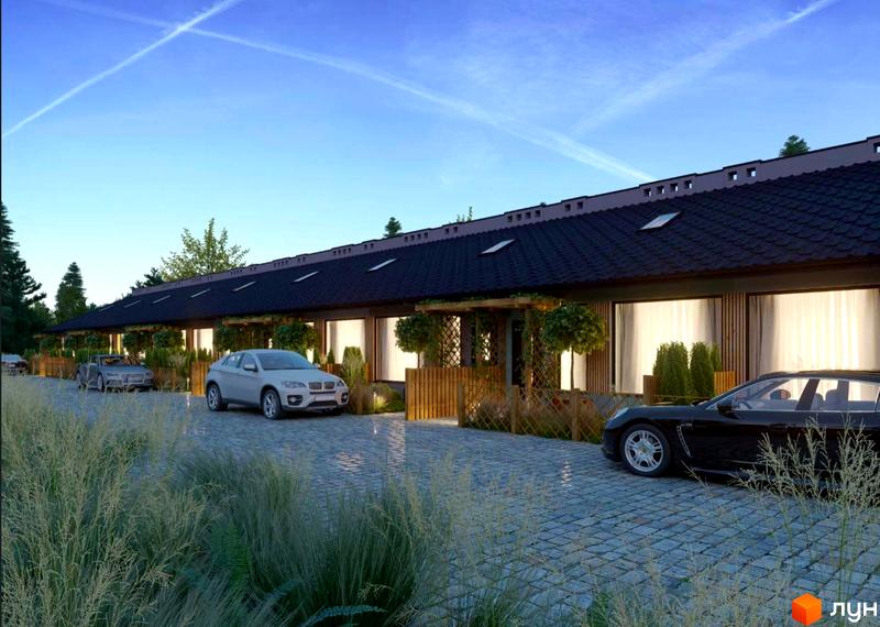 Таунхауси Harmony Land з темним дахом та великими вікнами, розташовані на брукованій території з автомобілями та зеленню.