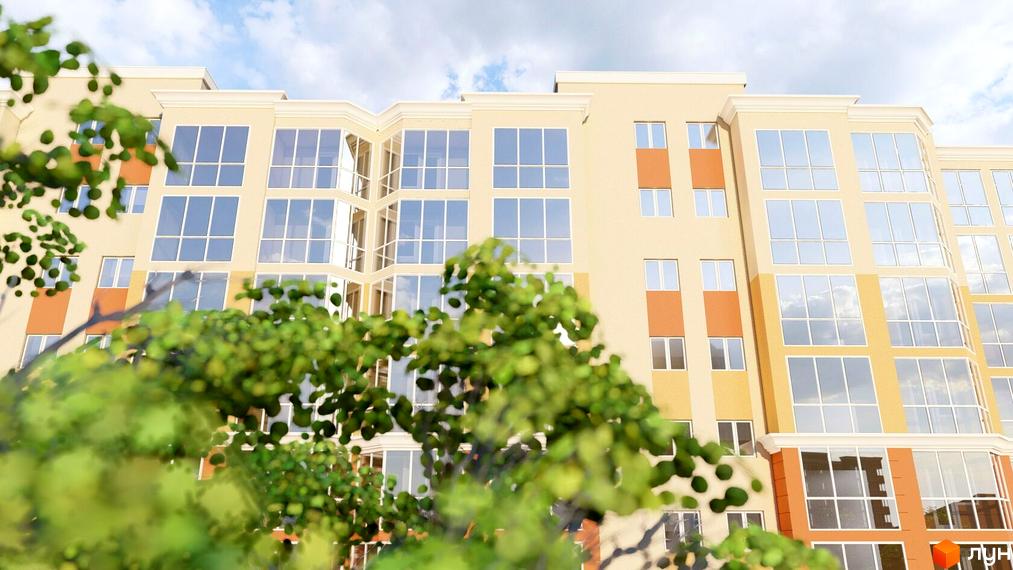 Житловий комплекс Еней з великими вікнами та світлим фасадом. На передньому плані зелені дерева, що додають природності.