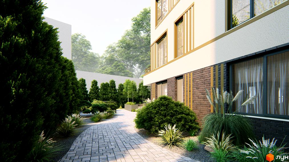 Зовнішній вигляд будівлі Житловий комплекс Озера Йозефа з цегляною кладкою та доглянутою прибудинковою територією з бруківкою та рослинами.