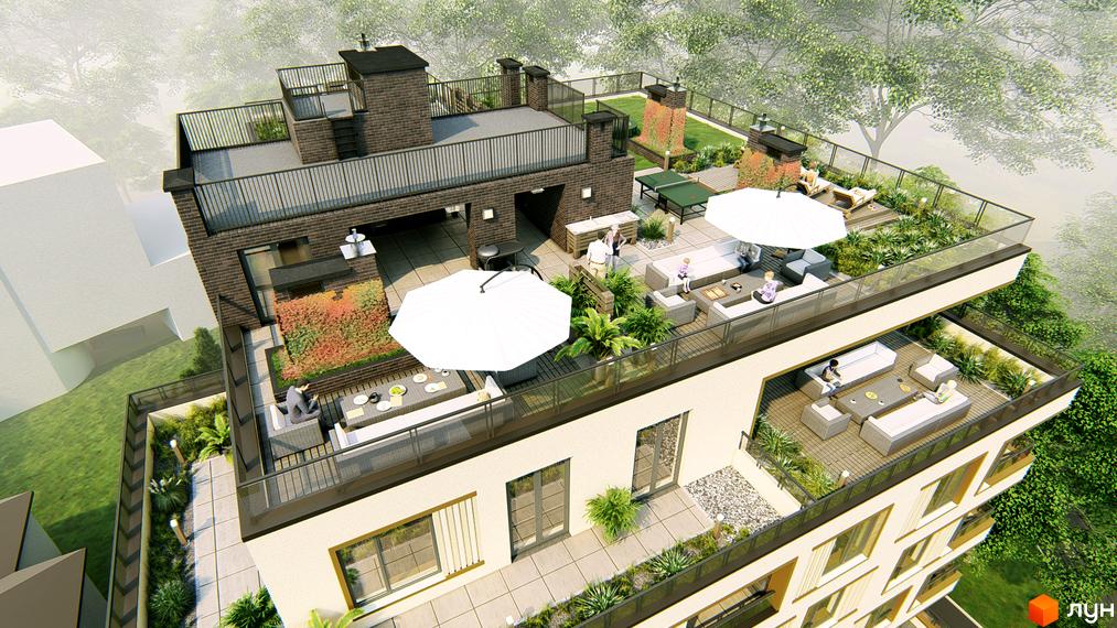 Вигляд зверху на Житловий комплекс Озера Йозефа з багаторівневими терасами на даху, облаштованими зонами відпочинку та зеленню.