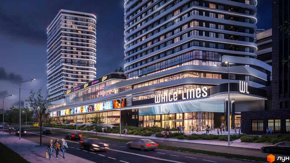 Житловий комплекс White Lines. Високоповерхові будинки з панорамними вікнами та яскравою підсвіткою. На першому поверсі розташовані магазини та заклади.