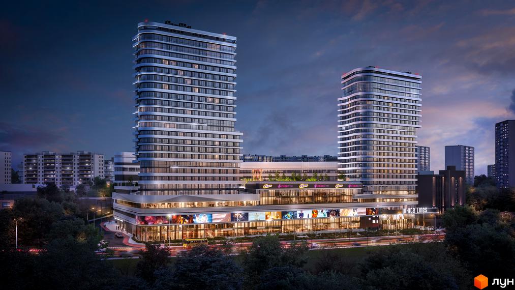 Житловий комплекс White Lines з висотними будинками. На фасадах великі вітрини магазинів, навколо зелені насадження та освітлення.