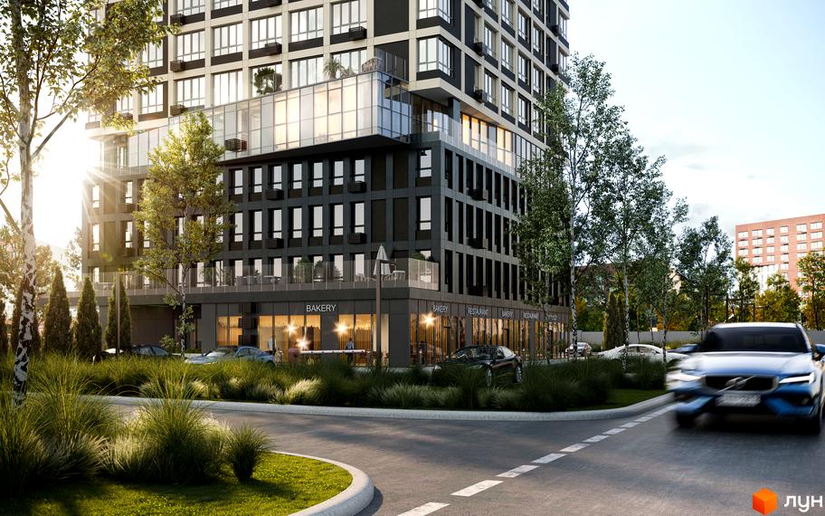 Висотна будівля ЖК Park Residence з великими вікнами та комерційними приміщеннями на першому поверсі. На прибудинковій території розташовані дерева, газон та дорога.
