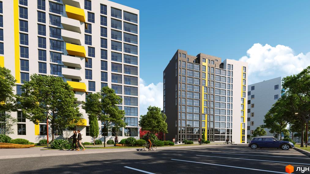 Житловий комплекс Riel City з сірими та білими фасадами, жовтими акцентами та великою кількістю вікон. На прибудинковій території ростуть дерева, облаштовані доріжки та місця для відпочинку.