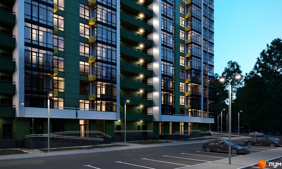 Висотна новобудова ЖК Київські Зорі-2 з великими вікнами та підсвічуванням, поруч парковка та ліхтарі.