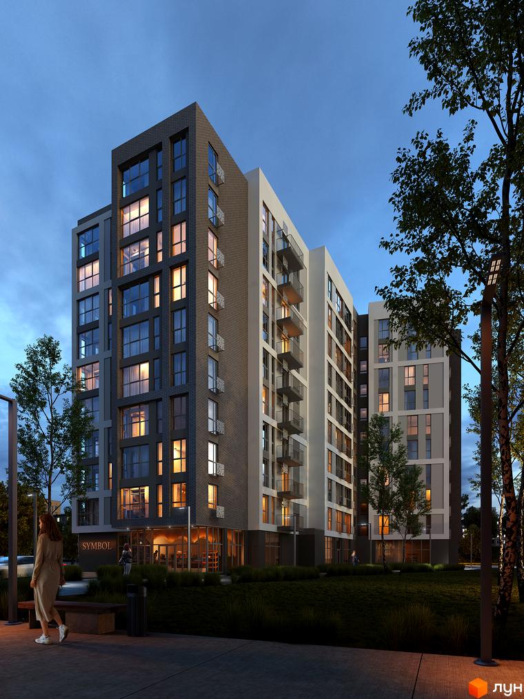 Зовнішній вигляд новобудови ЖК SYMBOL з цегляним та світлим фасадом та балконами. Навколо будинку зелена прибудинкова територія з деревами та освітленням.
