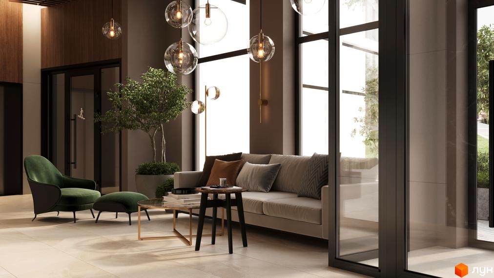 Інтер'єр лобі житлового комплексу SYMBOL з диваном, кріслом та кавовим столиком. Навколо великі вікна з видом на зелень.