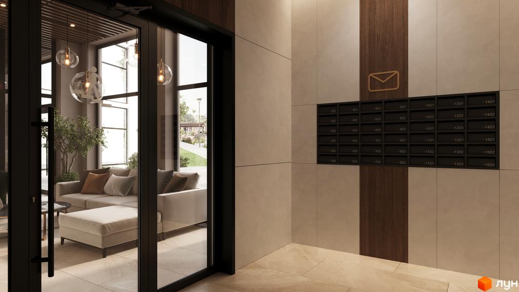 Зовнішній вигляд новобудови ЖК SYMBOL: вхідна група з диваном та вікнами, поштові скриньки на стіні.