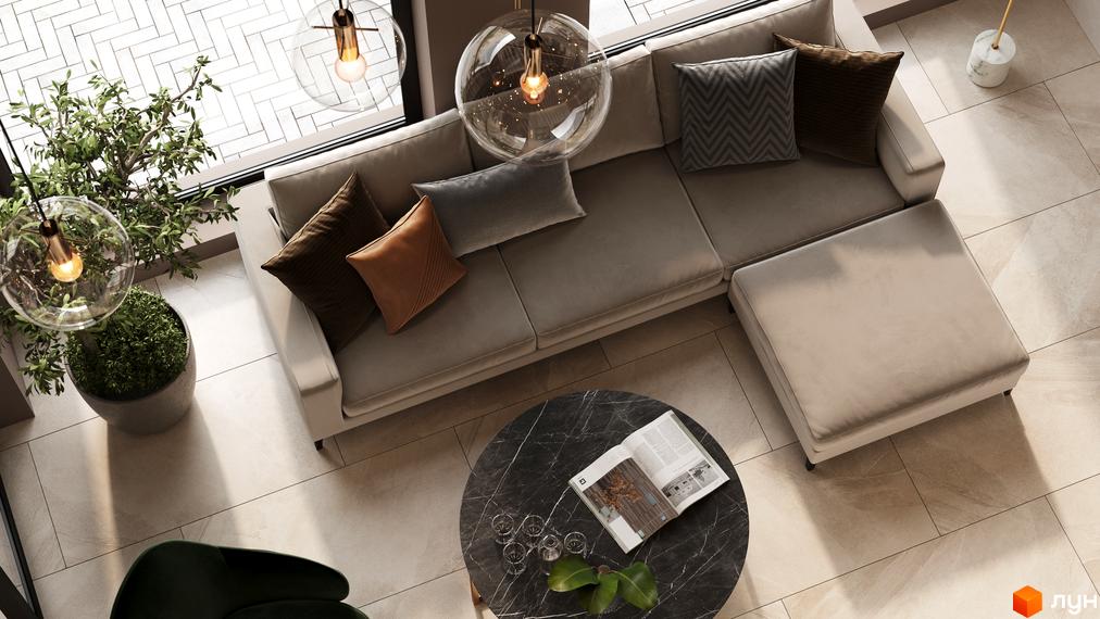 Вітальня з диваном та журнальним столиком у житловому комплексі SYMBOL. Сучасний дизайн інтер'єру та великі вікна.