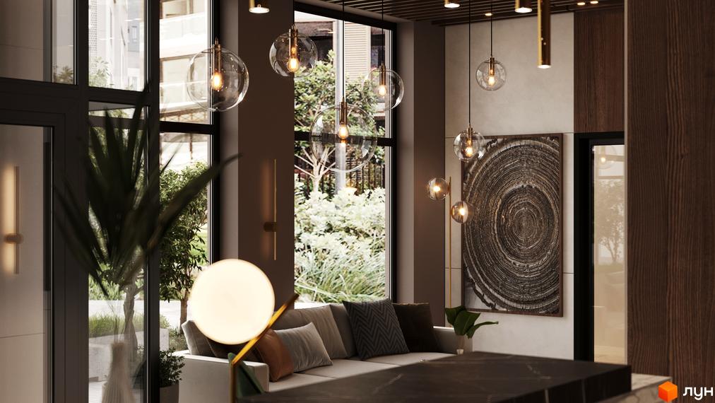 Інтер'єр вітальні в житловому комплексі SYMBOL з диваном, картиною та освітленням. Сучасний дизайн та комфорт для вашого життя.