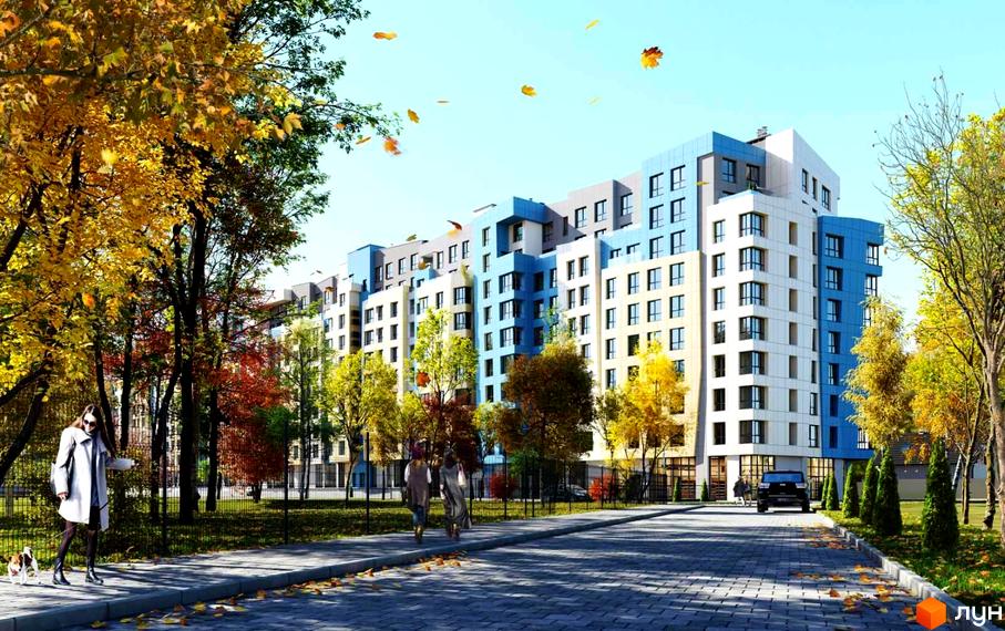 Житловий комплекс Парк Арена з фасадами біло-блакитного кольору, розташований серед осінніх дерев. Навколо новобудови облаштована прибудинкова територія з пішохідною зоною та зеленими насадженнями.
