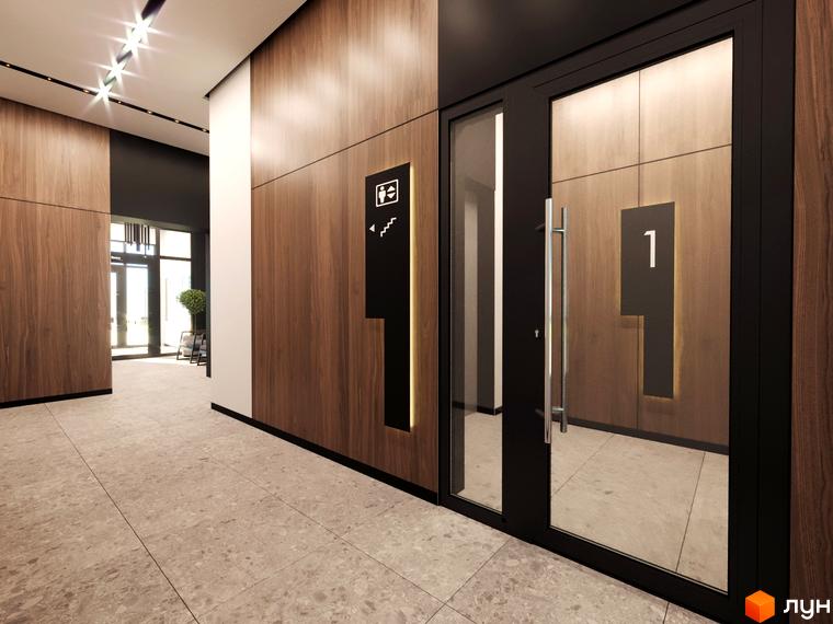 Сучасний вхід до ліфта в ЖК Бетховен з дерев'яними панелями та освітленням. Оздоблення під'їзду відповідає загальному стилю комплексу.
