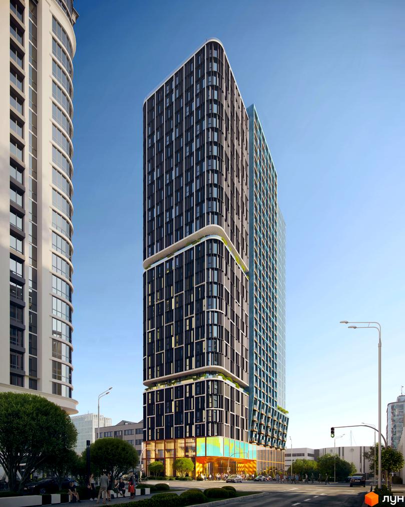 Сучасний житловий комплекс на вулиці Володимиро-Либідська, 25, з фасадами з темних та світлих панелей і скляними елементами. Навколо комплексу зелені насадження та міська інфраструктура.