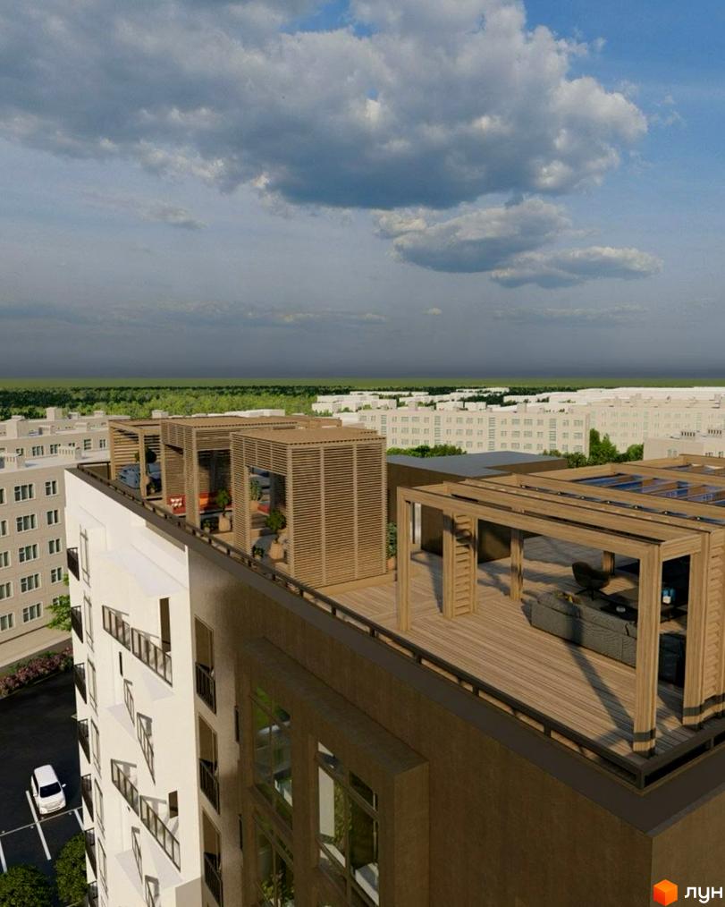 Вигляд зверху на Житловий комплекс Сонячна Долина з білим та коричневим фасадом. На даху облаштовані дерев'яні зони відпочинку.