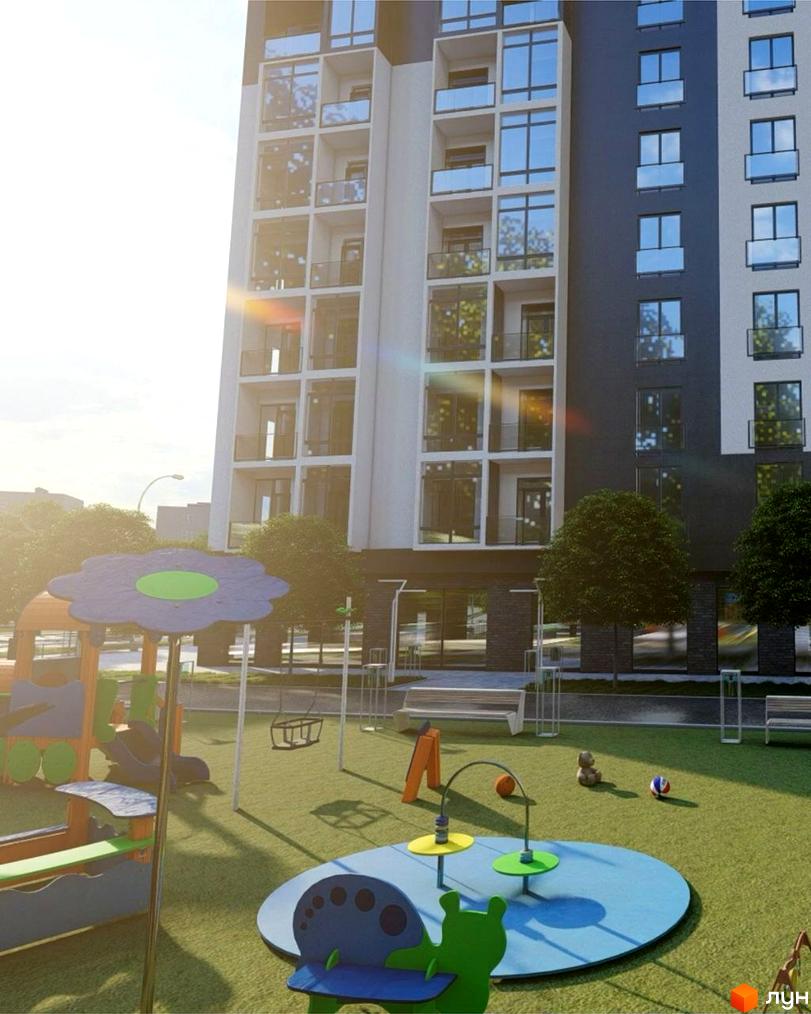 Багатоповерховий будинок Житлового комплексу Сонячна Долина з білим та темно-сірим фасадом. На прибудинковій території зелений газон та дитячий майданчик.