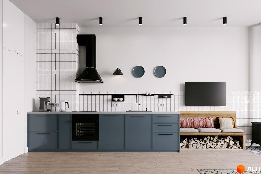 Сучасна кухня з сірими фасадами, витяжкою та білою плиткою. Поруч розташована зона відпочинку з дерев'яною лавкою.