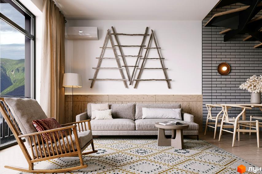 Інтер'єр вітальні в житловому комплексі AMA FAMILY RESORT з диваном, кріслом та декоративними драбинами на стіні. Затишна атмосфера для відпочинку.