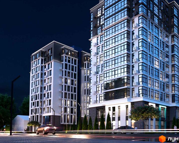 Житловий комплекс Смарт Сіті 2. Сучасна архітектура будівель з великою кількістю скління, нічне освітлення. Прибудинкова територія з деревами та дорогою.