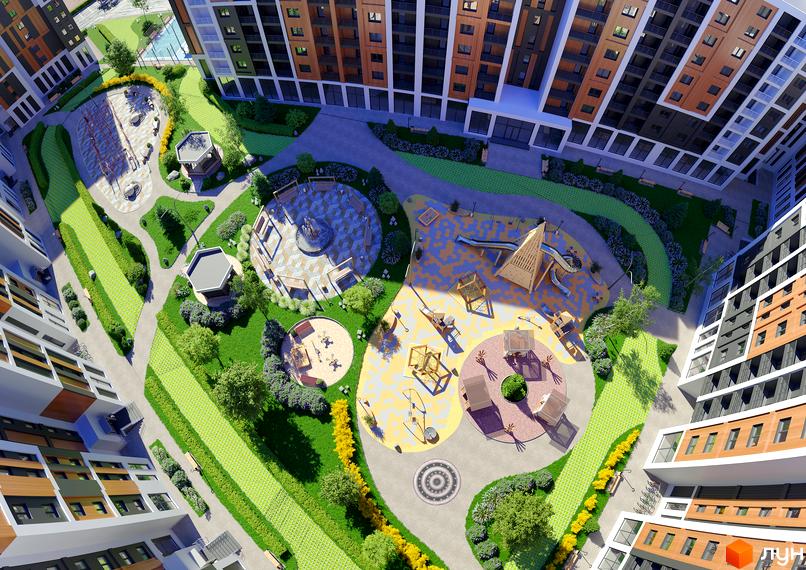 Житловий комплекс КЕЛЬЦЕ: вид зверху на будівлі з дерев'яними та цегляними фасадами та зелену прибудинкову територію з дитячим майданчиком та зонами відпочинку.