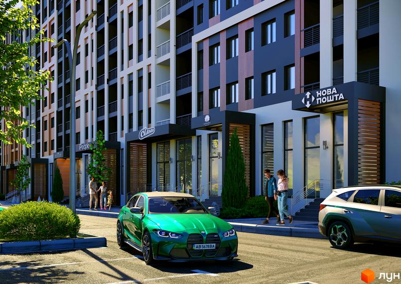 Новобудова ЖК КЕЛЬЦЕ з фасадом з геометричними елементами та паркінгом, зеленою зоною та автомобілями на вулиці.