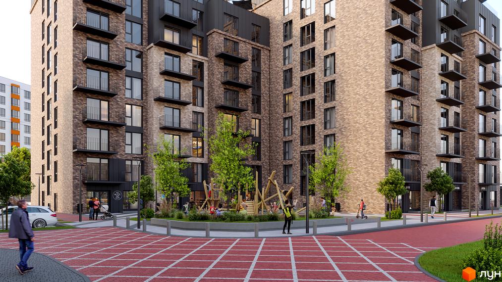 Житловий комплекс Квартал Віденський. Фасад будинку з цегляним облицюванням, балконами та великими вікнами. Територія з дитячим майданчиком та зеленими насадженнями.