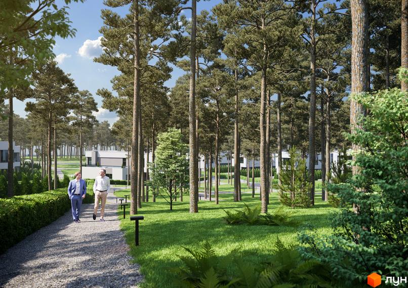 Котеджне містечко Inwood: два чоловіки прогулюються алеєю серед високих сосен, на задньому плані видно сучасні будинки та зелену територію.