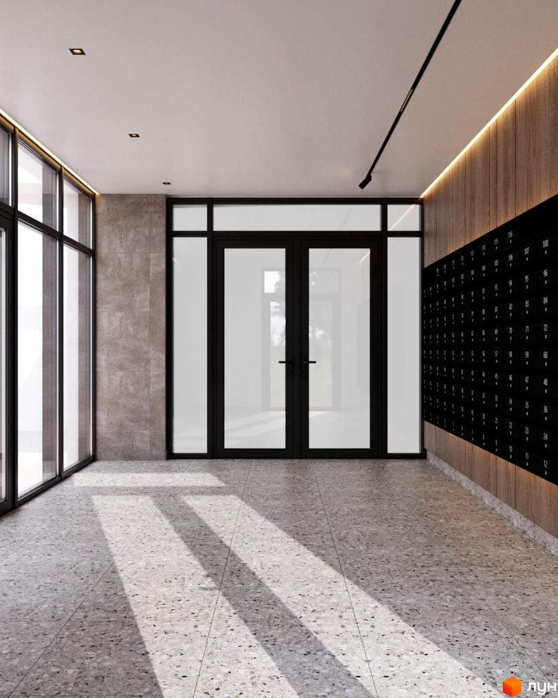 Інтер'єр вхідної групи Житлового комплексу Янтарний з поштовими скриньками та великими вікнами. Підлога вкрита плиткою з текстурою каменю.